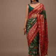 bottle_green_saree_in_silk_with_multi_colored_patola1.webp