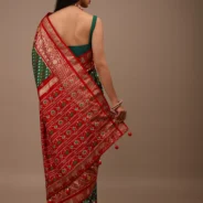 bottle_green_saree_in_silk_with_multi_colored_patola3.webp