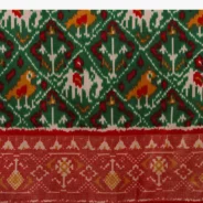 bottle_green_saree_in_silk_with_multi_colored_patola4.webp