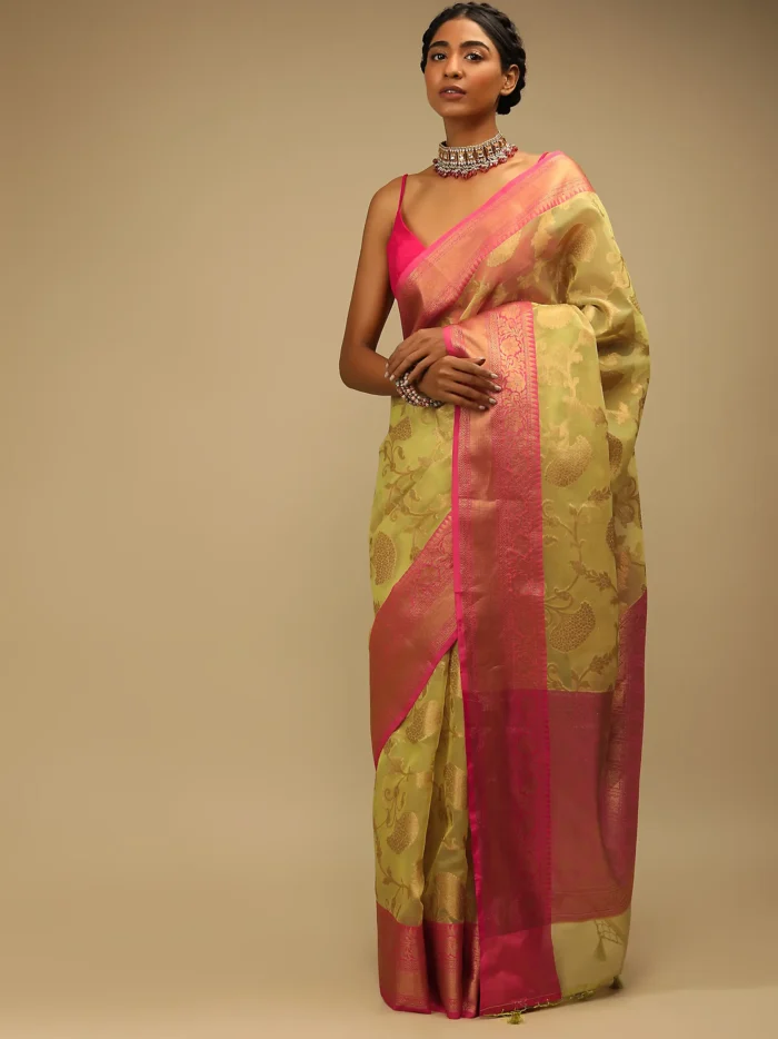 celery_green_saree_in_organza_silk_with_golden_brocade_woven1.webp