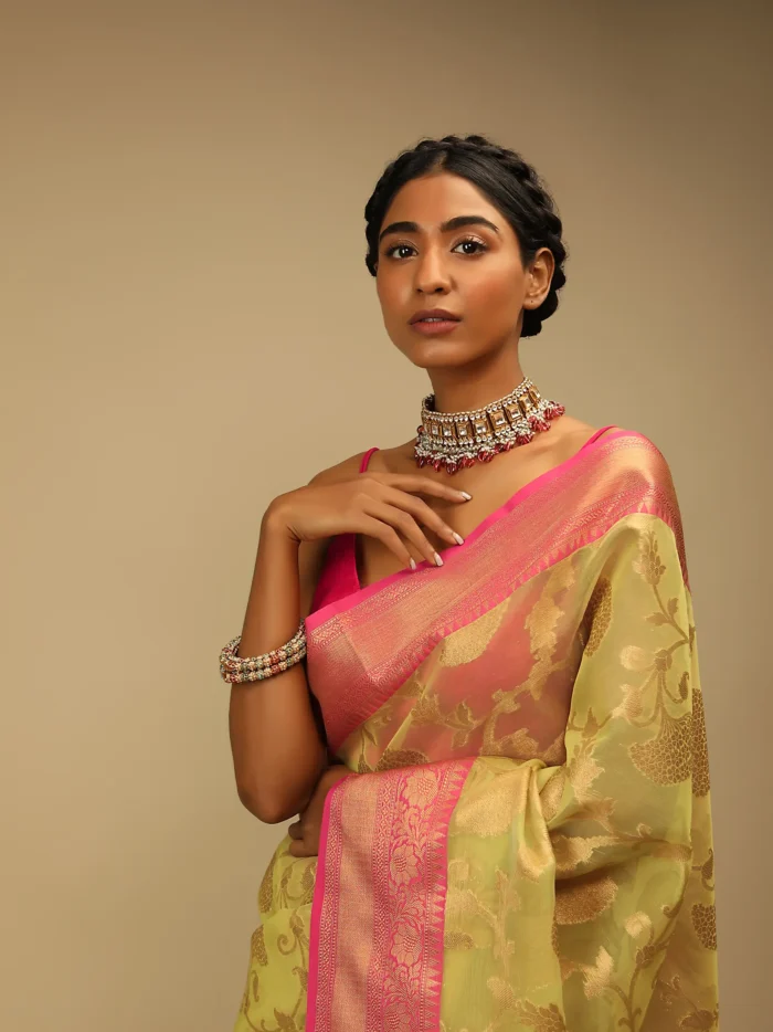celery_green_saree_in_organza_silk_with_golden_brocade_woven2.webp