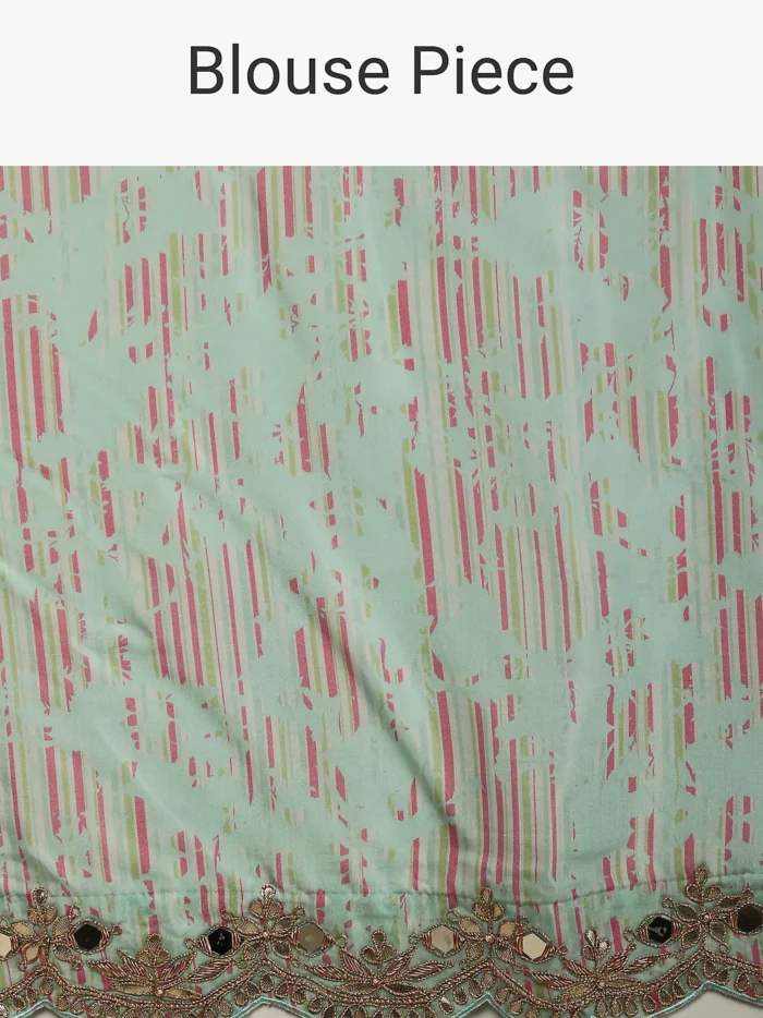 mint_saree_in_cotton_silk_with_contrasting_floral_print.webp