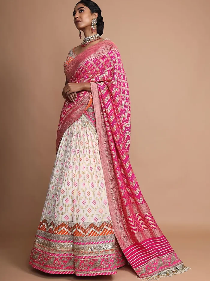 off-white-lehenga-with-bandhani-print_-weaved-design-and-heavy-gotta-work-border-online-kalki-fashion-.webp