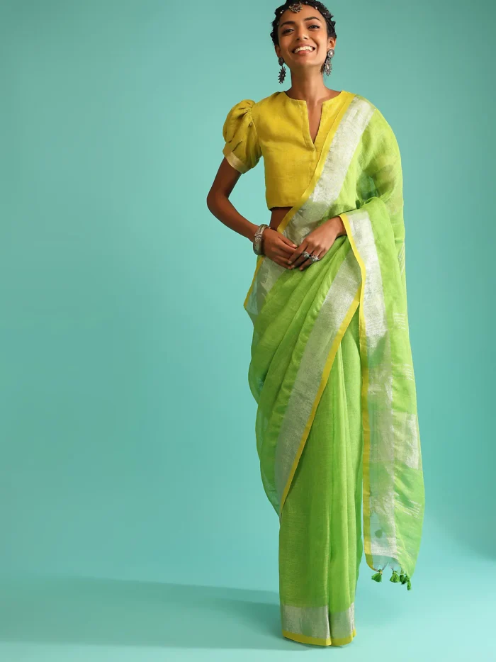 parrot-green-saree-in-linen-with-silver-brocade-border-and-striped-pallu-along-with-yellow-unstitched-blouse1.webp