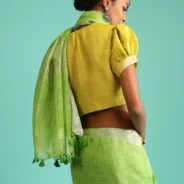 parrot-green-saree-in-linen-with-silver-brocade-border-and-striped-pallu-along-with-yellow-unstitched-blouse3.webp